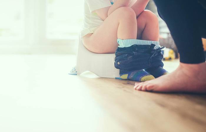 Teaching child how to use his potty