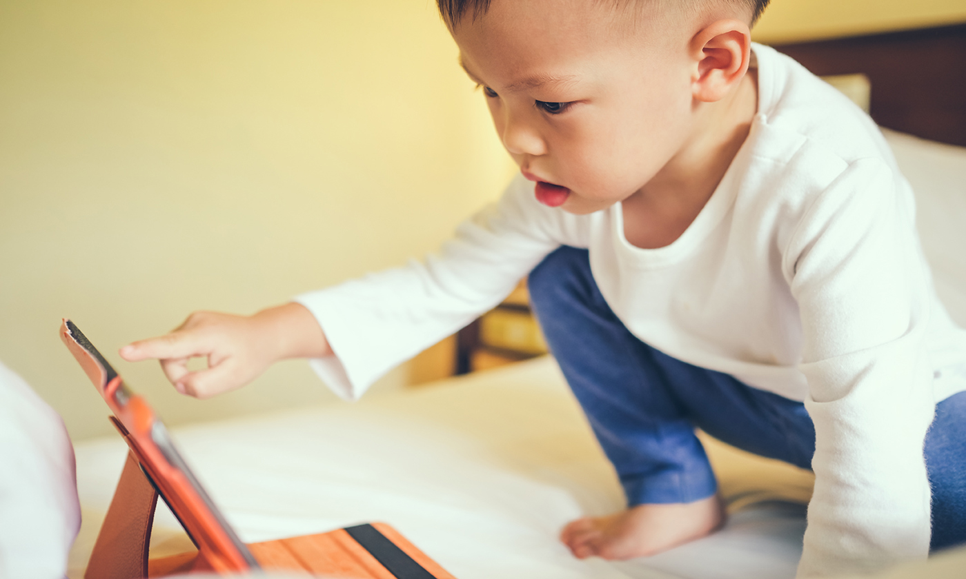 Toddler using tablet