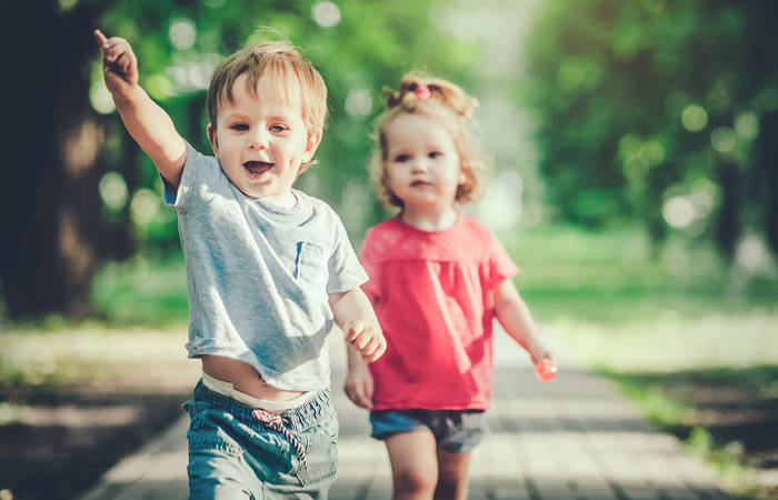 Happy children having fun in summer park