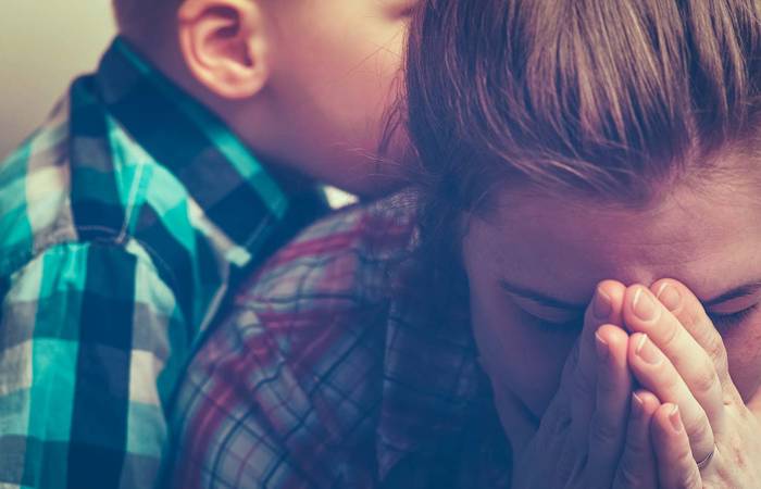 Sad mother with child