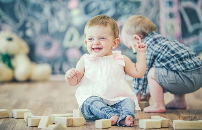 Toddlers playing with blocks