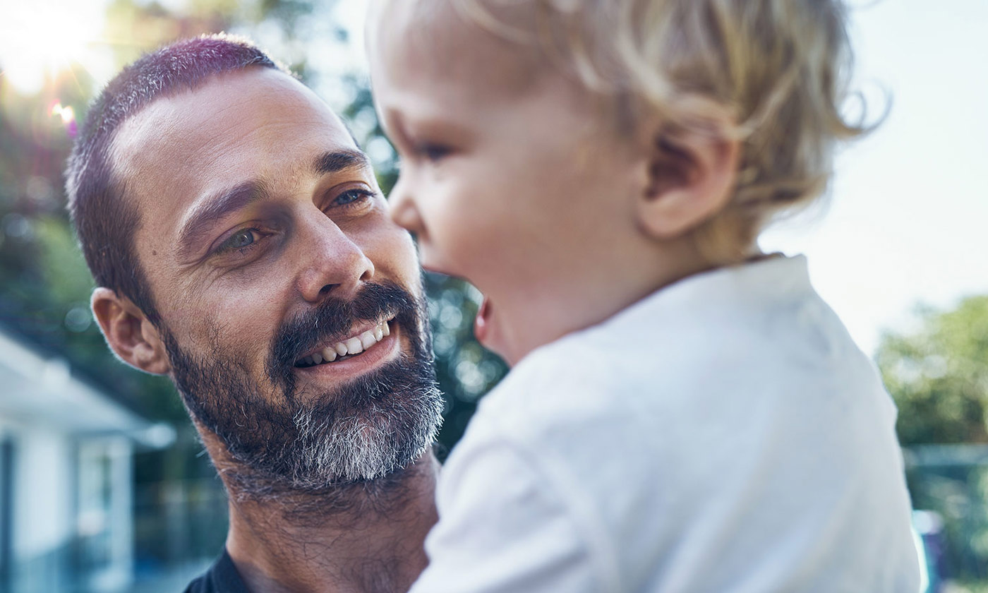 Father playing with his baby boy