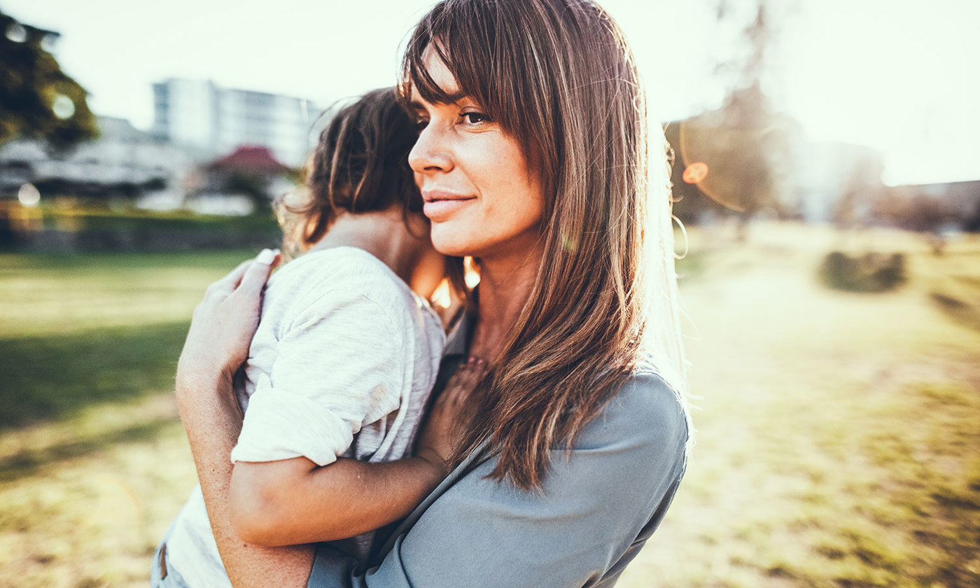 Mother comforting small child