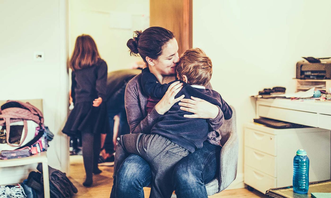 Mother comforting little boy